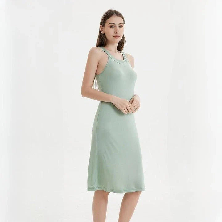 Elegant silk-blend halter midi dress in green and white, perfect for Kiwi women's summer fashion