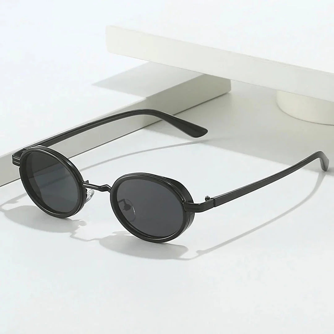 Stylish gradient oval sunglasses with a retro-inspired design, perfect for protecting Kiwi eyes from harmful UV rays.