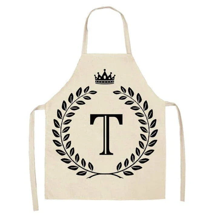 A crown and letter printed kitchen apron made of high-quality cotton and linen, suitable for both men and women in New Zealand kitchens.