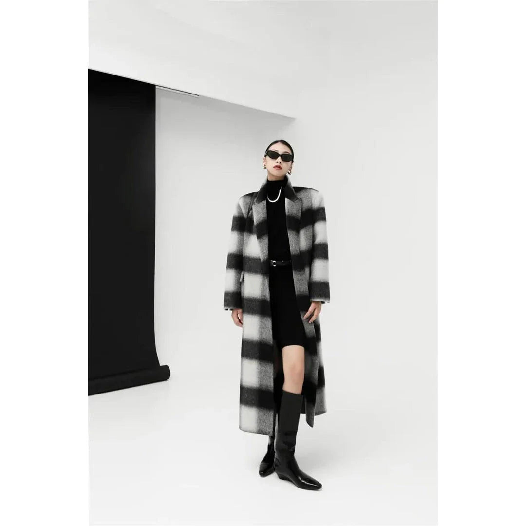 A stylish plaid double-breasted long wool coat for fashionable Kiwi women, featuring a cozy and elegant design with functional pockets and a versatile turn-down collar.