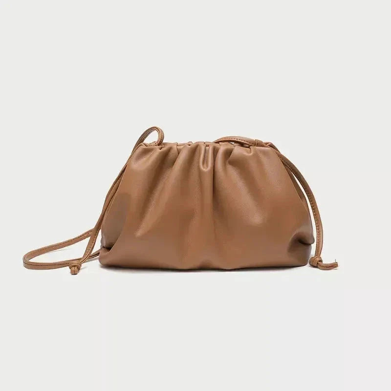 Elegant soft PU leather crossbody bag in a timeless brown colour, featuring a versatile design and premium quality construction.