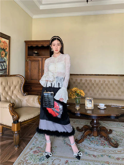 Lace patchwork shirt with ruffled sleeves in a beige color, perfect for casual and formal occasions