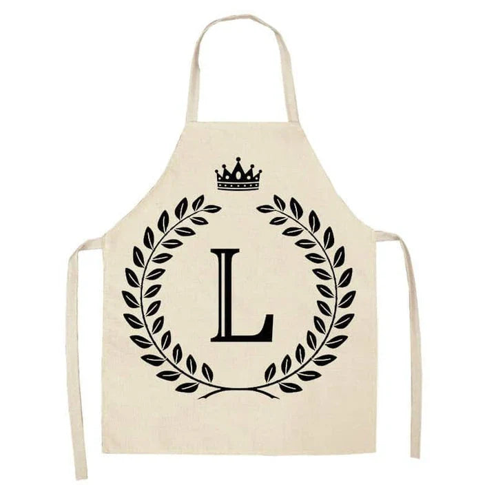 A crown and letter printed kitchen apron made of high-quality cotton and linen, suitable for both men and women in New Zealand kitchens.