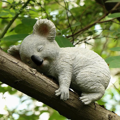 A charming and realistic outdoor koala statue made of high-quality resin, perfect for decorating Kiwi gardens and backyards.