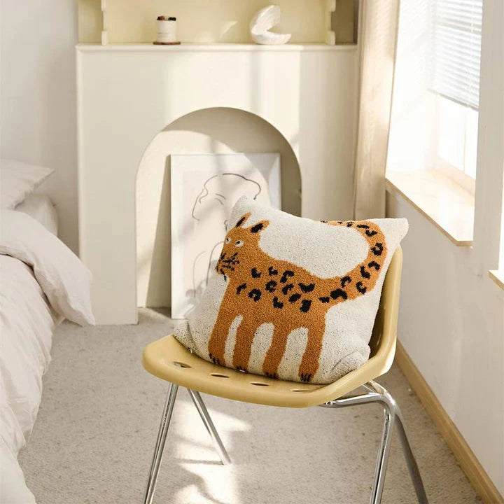 Cosy spot cat microfibre knitted cushion cover in soft beige, adding a playful touch to Kiwi living spaces.