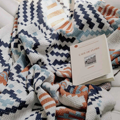 Cozy boho geometric cotton blanket in multicolor design, perfect for adding style and comfort to Kiwi homes and outdoor spaces