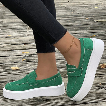 Women's casual platform loafers with a round toe design, slip-on construction, and a durable rubber sole for everyday comfort and style.