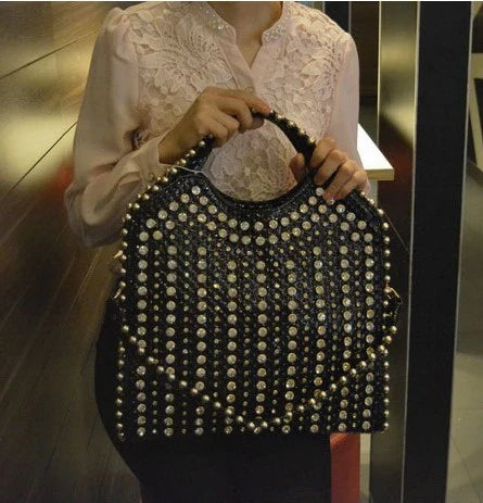 Stylish diamond-studded messenger bag with premium PU leather construction and sparkling rhinestones