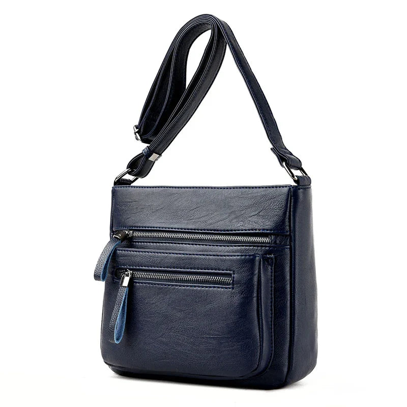 Soft leather shoulder bag in a classic box shape with a trendy tote silhouette, perfect for the modern Kiwi mum