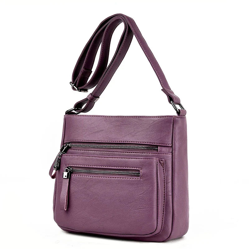 Soft leather shoulder bag in a classic box shape with a trendy tote silhouette, perfect for the modern Kiwi mum