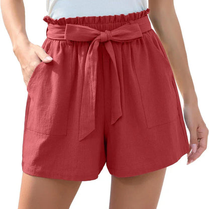 Stylish high-waisted ruffle bow shorts in black, perfect for Kiwi summer beach and casual wear