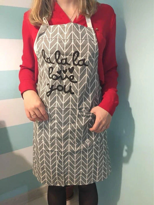 Stylish cotton kitchen apron with vibrant, Kiwi-inspired print design