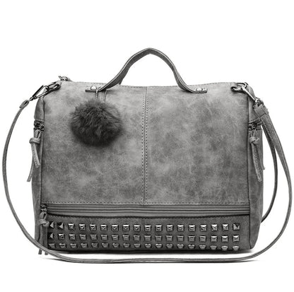 Stylish autumn pillow bag in matte PU leather with rivet detailing, ideal for Kiwi women's fashion