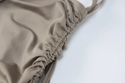 A stylish one-shoulder top and drawstring skirt set made from premium milk silk fabric, perfect for elevating your casual wardrobe.