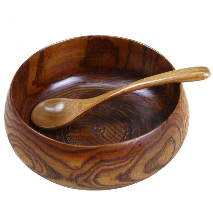 A large, round wooden soup bowl with a warm, natural brown color, perfect for serving hearty meals in Kiwi kitchens.