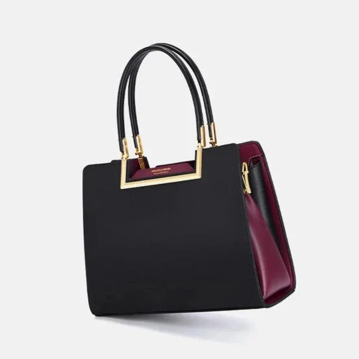 Stylish and spacious leather tote bag with multiple compartments, perfect for everyday use and special events