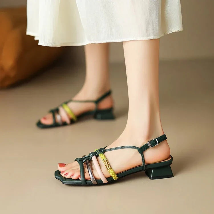 Vibrant Roman-inspired sandals with chunky heel, showcasing a stylish and comfortable summer footwear option