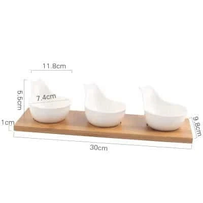 Stylish ceramic snack trays with natural wood pallet, perfect for serving nibbles and entertaining in Kiwi-style homes