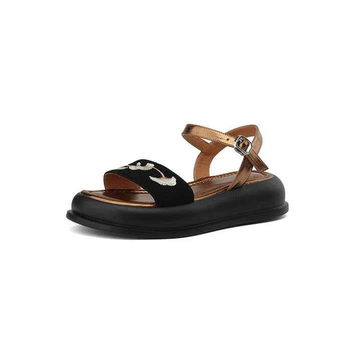 Embroidered platform sandals with kid suede upper and durable TPU outsole, designed for everyday comfort and style.