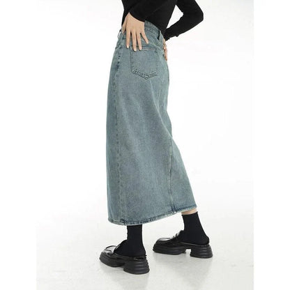 A stylish vintage-inspired denim midi skirt with a front slit, perfect for casual and special occasions.
