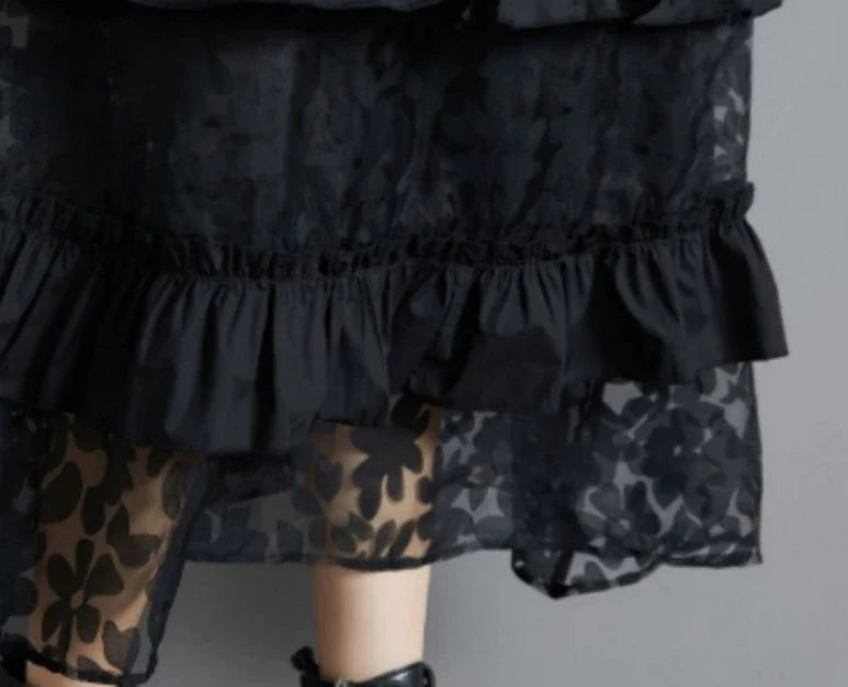 Stylish plus size black dress with lace stitching and long sleeves, perfect for retro-inspired style