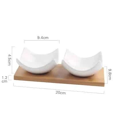 Stylish ceramic snack trays with natural wood pallet, perfect for serving nibbles and entertaining in Kiwi-style homes