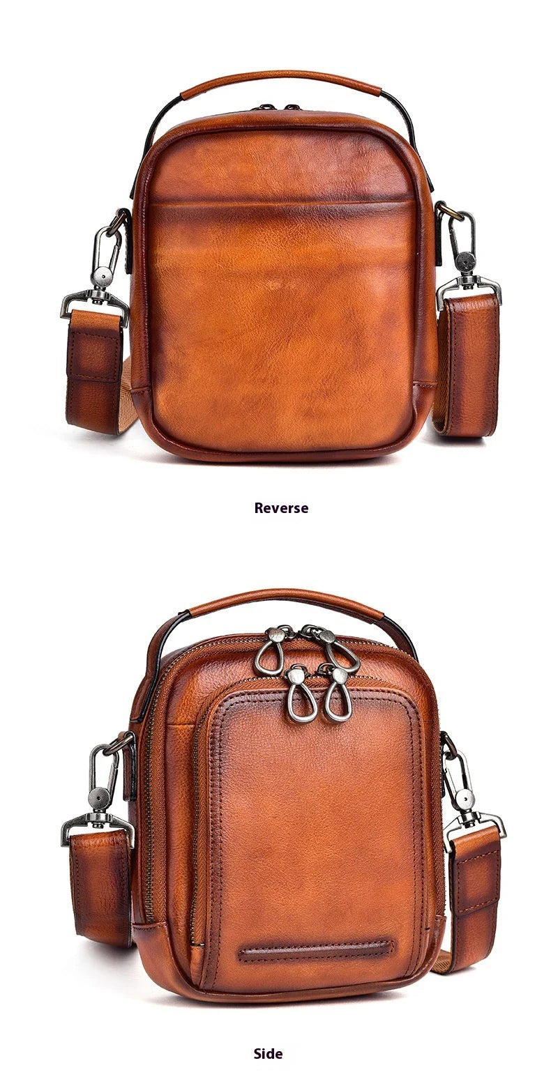 A rugged, retro-inspired cowhide messenger bag made in New Zealand, featuring a spacious interior, multiple pockets, and a comfortable single strap design.