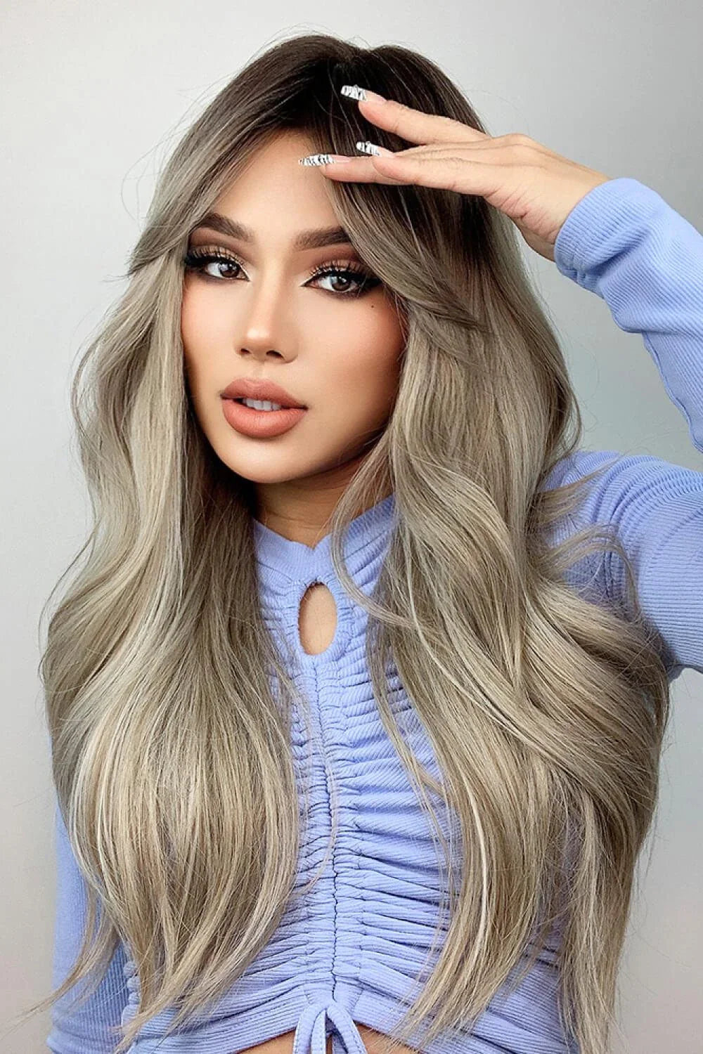 Stylish 26-inch long wave synthetic wig in silver/gray color with comfortable basic cap construction