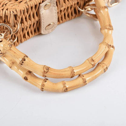 Rattan straw bag with intricate three-dimensional conch shell design, ideal for everyday use and a touch of coastal chic