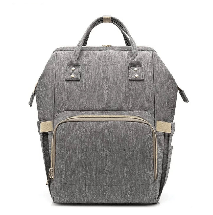 Stylish and practical mummy bag with reinforced handles, durable buckles, and separate bottling area for Kiwi mums