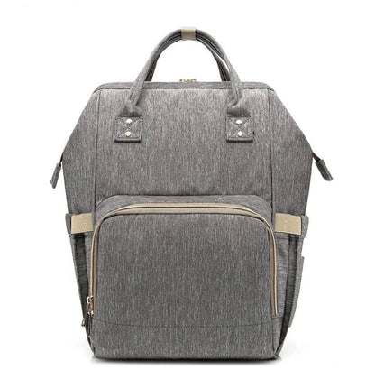 Stylish and practical mummy bag with reinforced handles, durable buckles, and separate bottling area for Kiwi mums