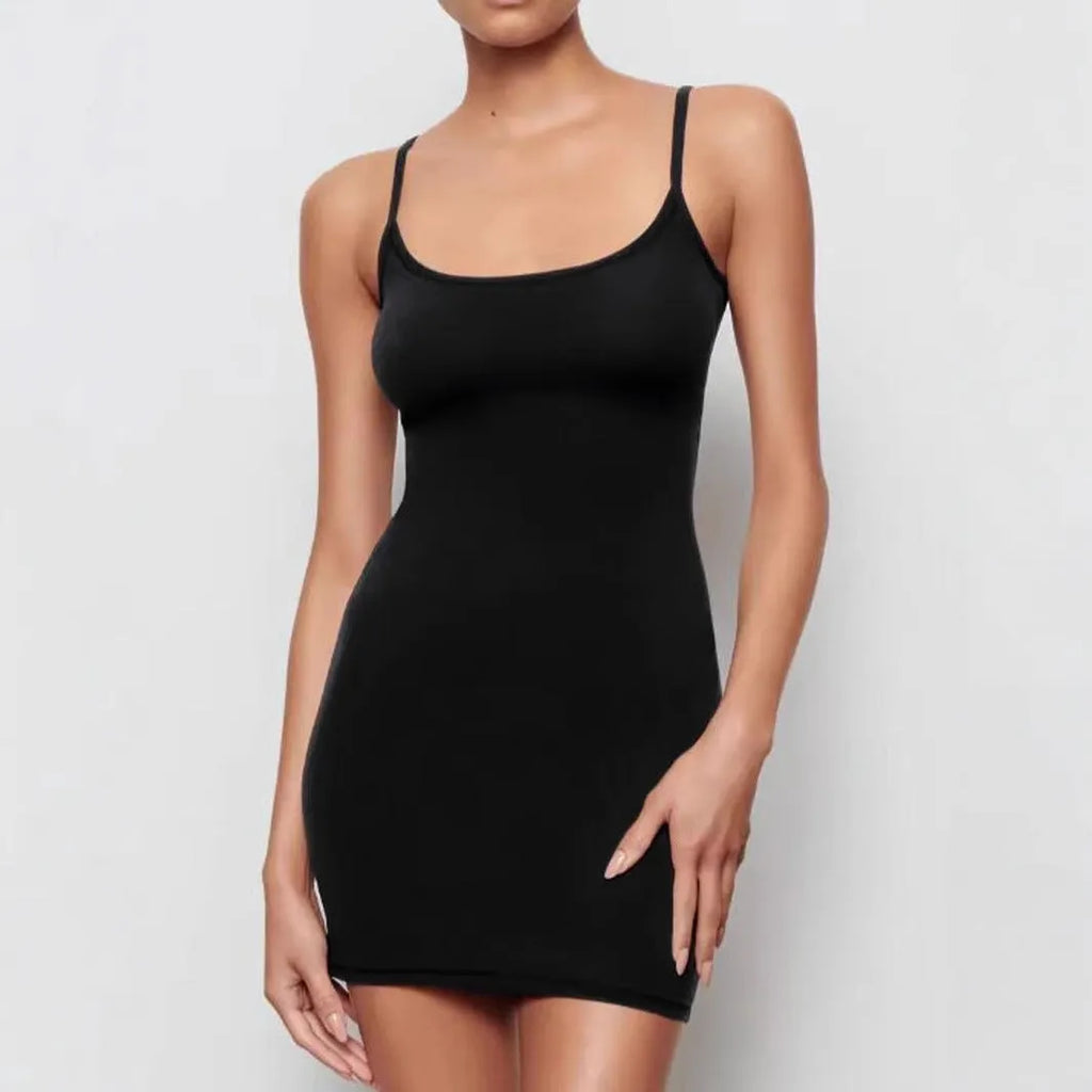 Black sleeveless skinny sheath dress with a sling style neckline.