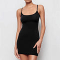 Black sleeveless skinny sheath dress with a sling style neckline.