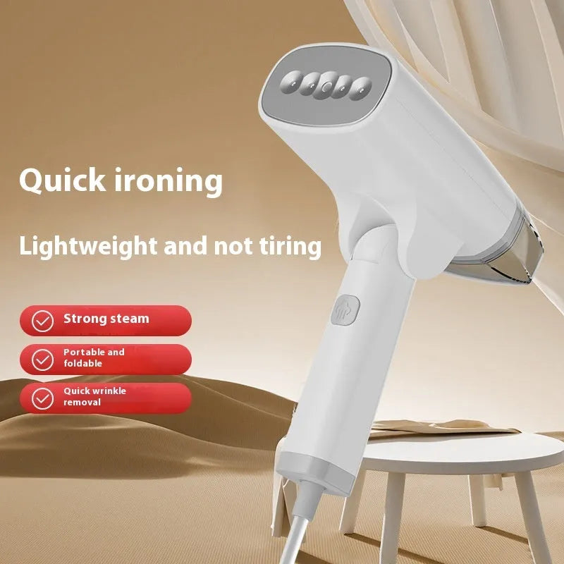 Blue and white handheld garment steamer with water tank and nozzle on a white background