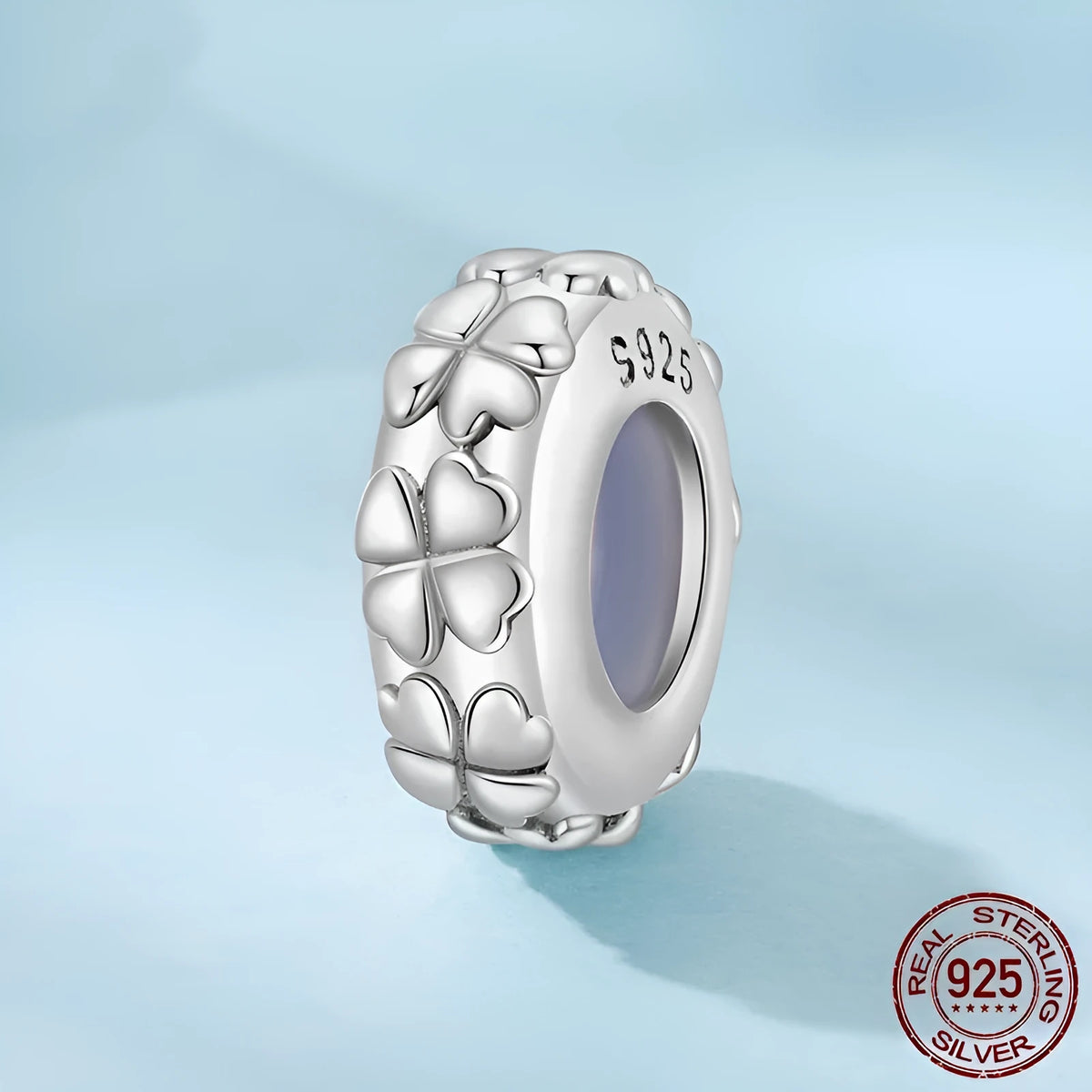 Four-leaf clover shaped S925 sterling silver spacer bead with pearlescent finish, 1.0cm height