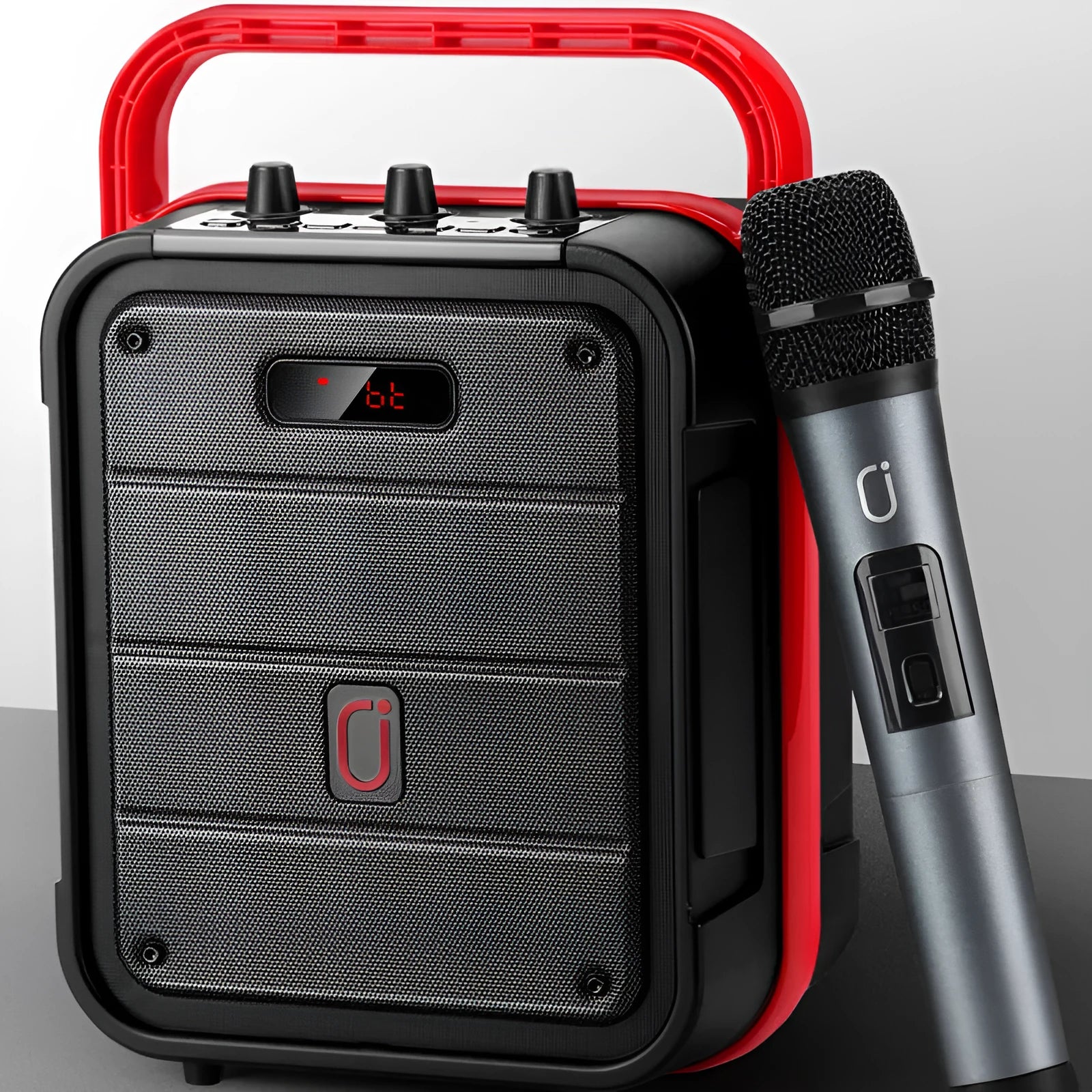 MS62AI black portable Bluetooth speaker with wireless microphone on table