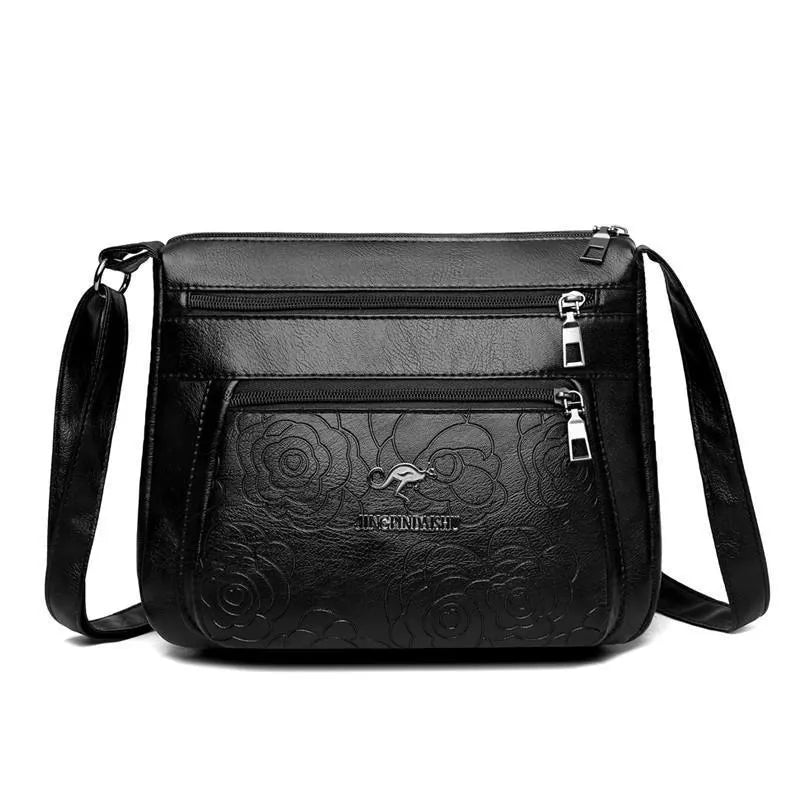 Women's black PU leather messenger bag with embossing and sewing thread details, horizontal square shape, single shoulder strap