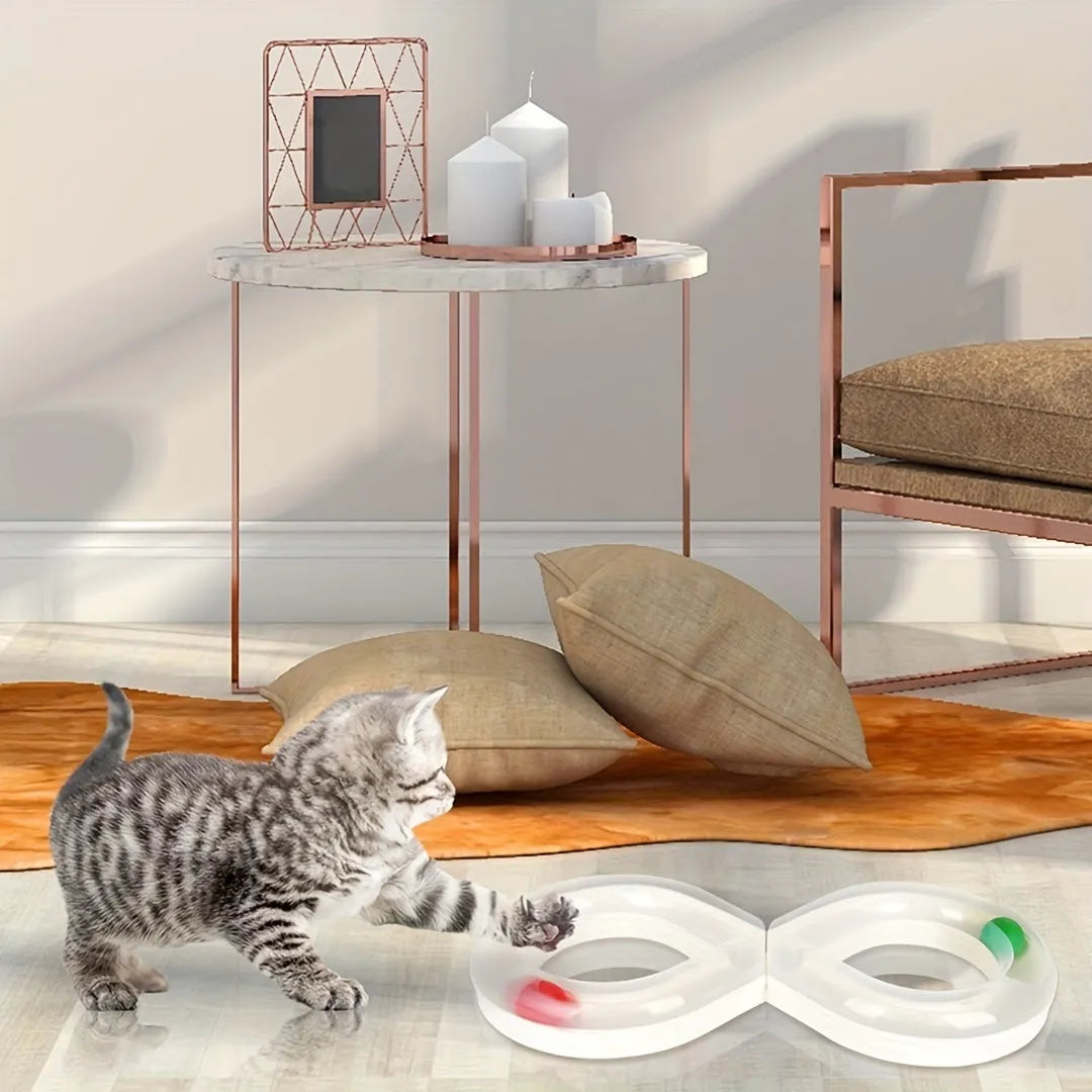 Blue interactive cat play track with turntable ball and four toy attachments on a white background.