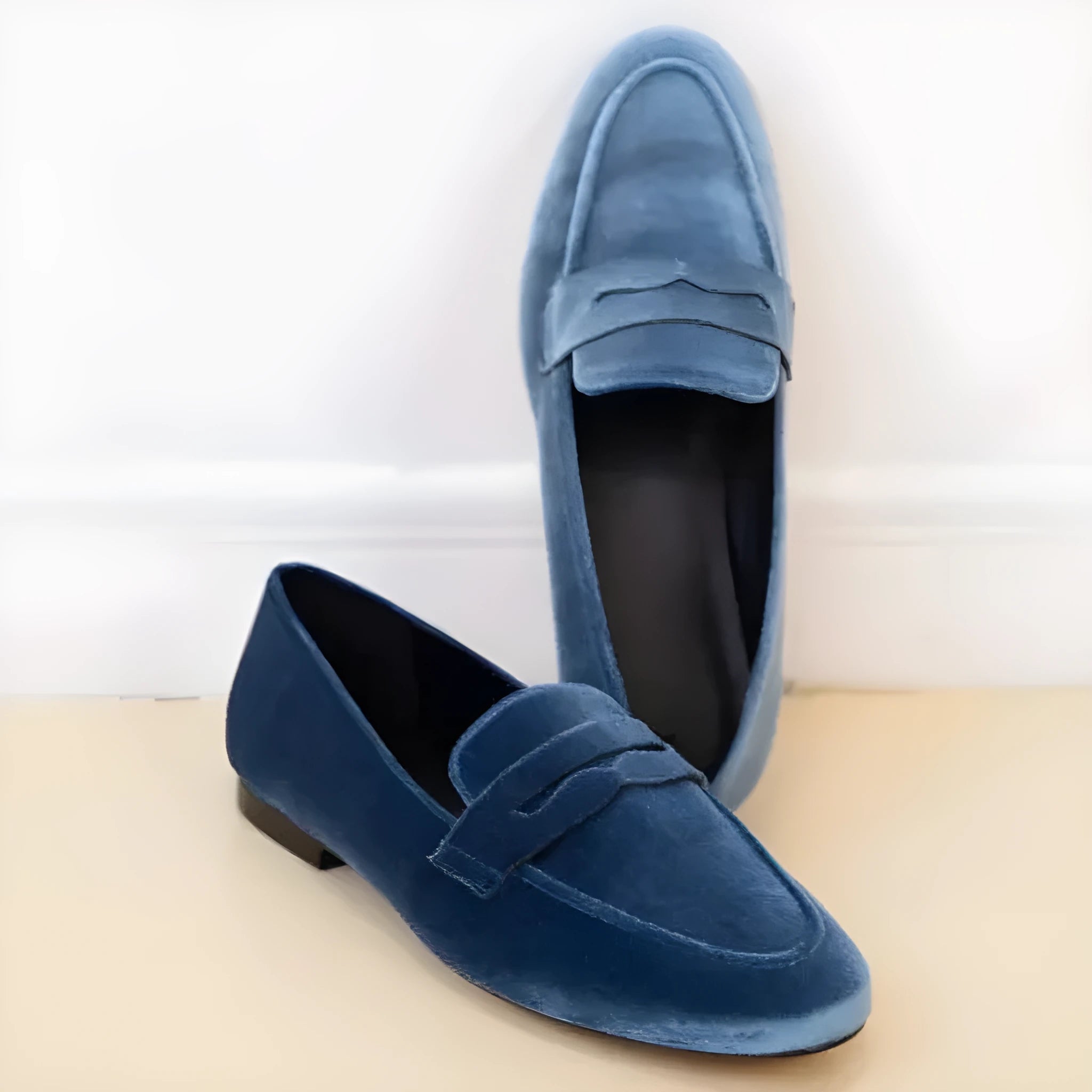 Blue and black sole flat loafers with a suede-look upper and round toe
