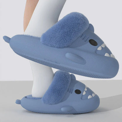 Cozy shark-inspired slippers in various colors, featuring plush, fuzzy material and durable non-slip soles