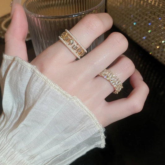 Pearl Hollowed-out Square Open-end Zircon Ring in gold, showcasing unique geometric design