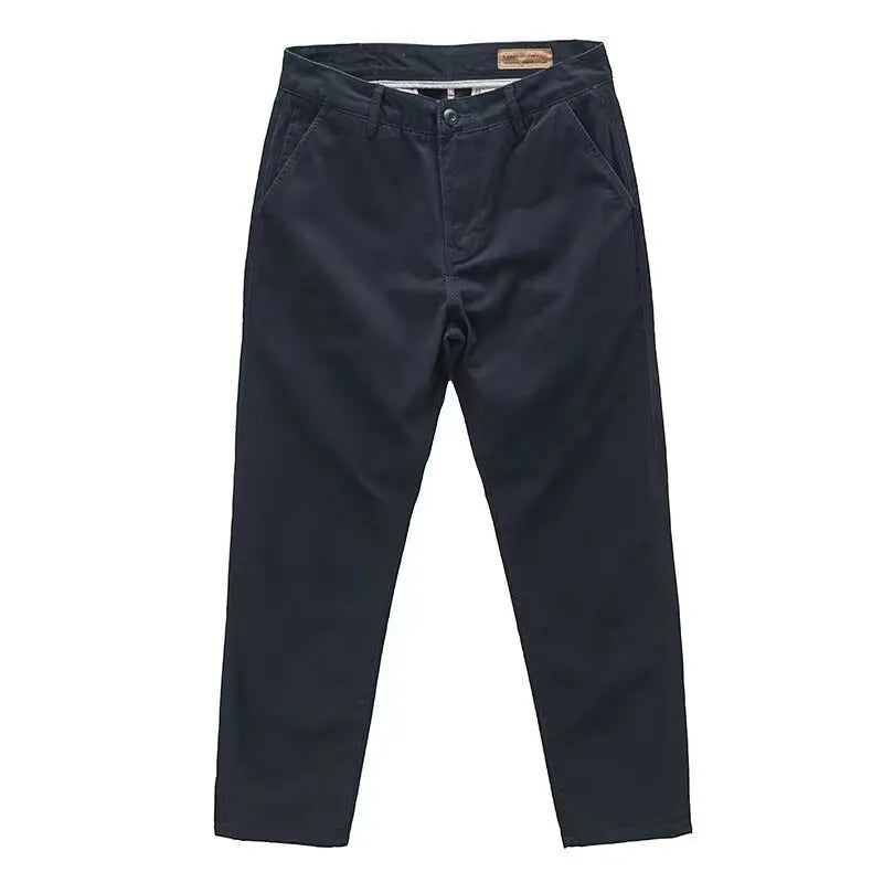 Men's slim-fit casual trousers in black with an elastic waistband and straight-leg cut.