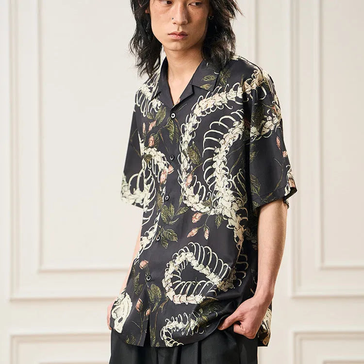 Short sleeve Cuban collar shirt with a snake bone pattern print in a loose fit.