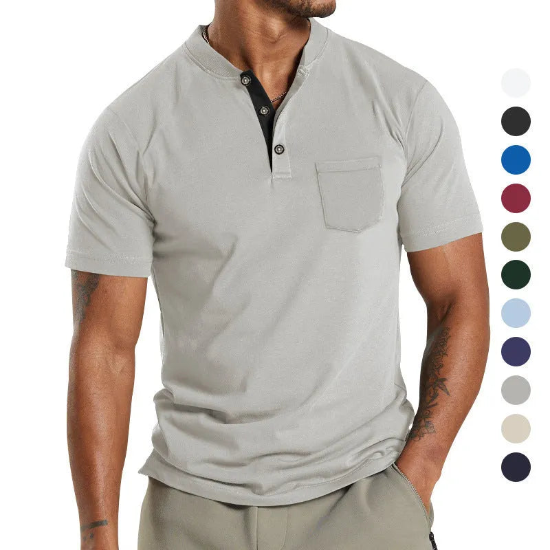 Plus size man wearing a light grey short sleeve polyester casual shirt with a button chest pocket.