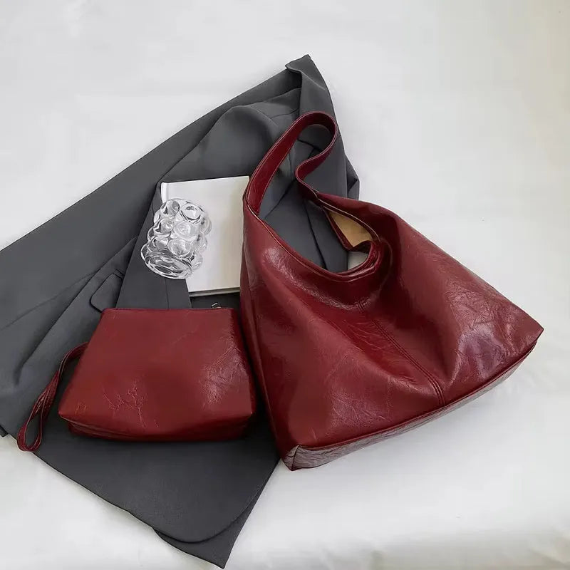 Women's large capacity PU shoulder tote bag in brown with sewing line detail and single strap