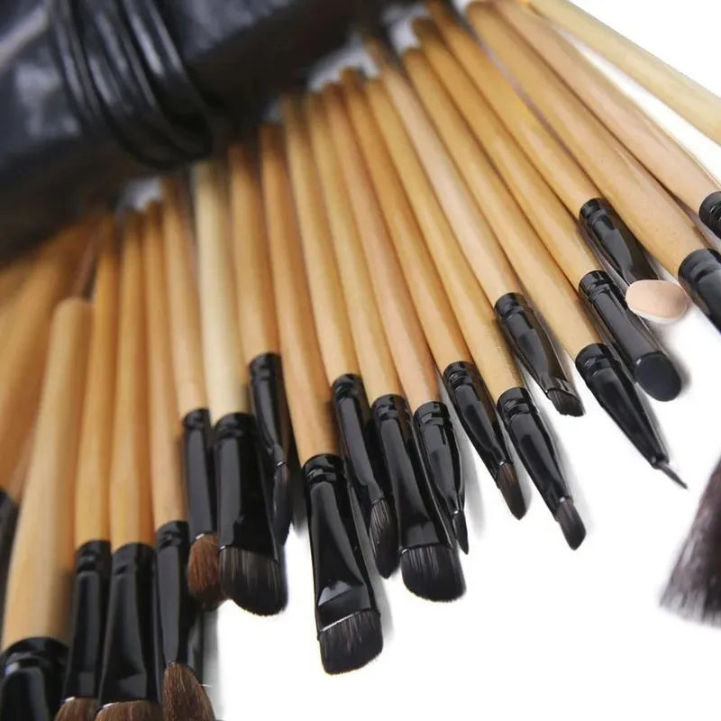 24 professional makeup brushes with wooden handles in a black PU carrying case