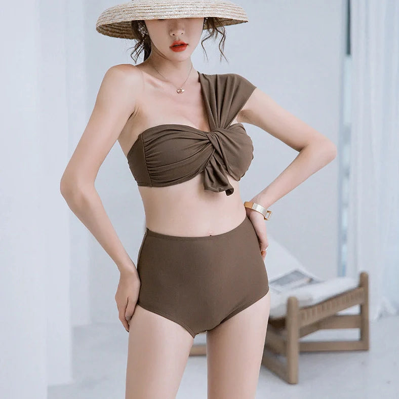 Women's one-shoulder swim bikini in black with high-waist design and split styling