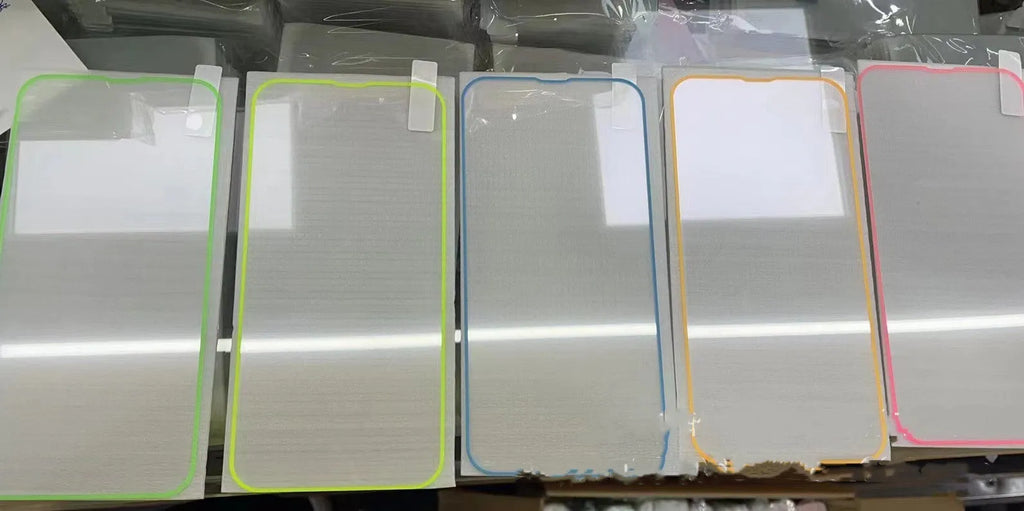 Fluorescent luminous tempered glass screen protector for iPhone in pink, yellow, green, blue, and grass green colours.