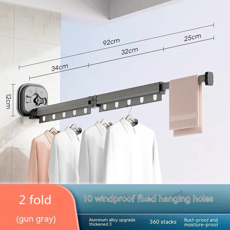 Aluminum retractable clothes drying rack mounted on wall with suction cups