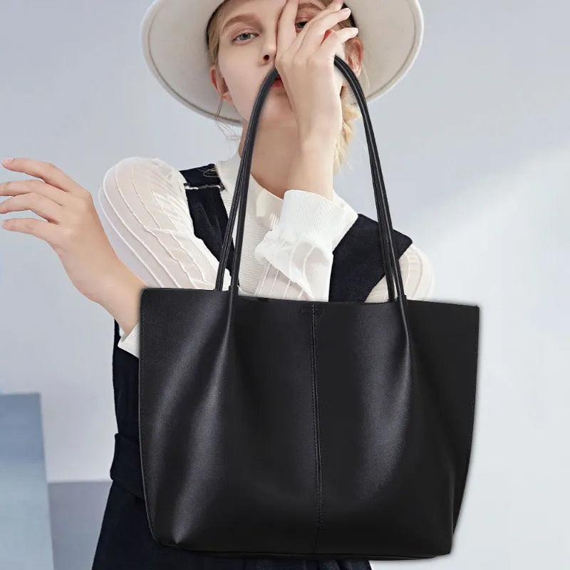 Women's large capacity soft PU shoulder bag in black with inner zip and outer sandwich pocket